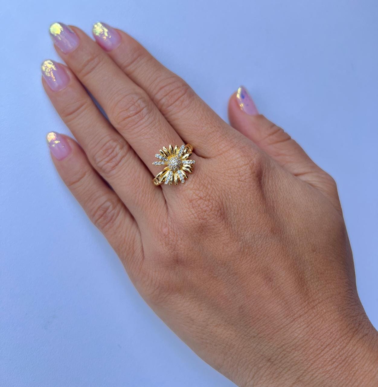 ANILLO AJUSTABLE FLOR RODIO